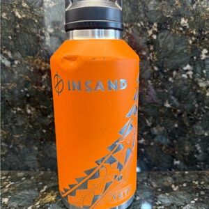 Yeti Orange Insulated Bottle with Silver Tribal Design